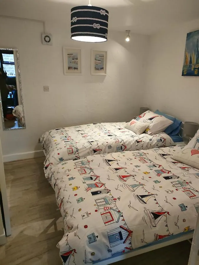 Holiday home Fishermen'S Cottage With Log Burner, 2 Bathrooms & Sea Views From Garden Terraces The Mumbles United Kingdom